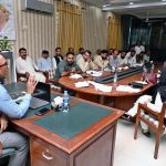 District Public Prosecutor Officer Malik Amir Shahzad addressing WAPDA officials during a meeting regarding legal matters