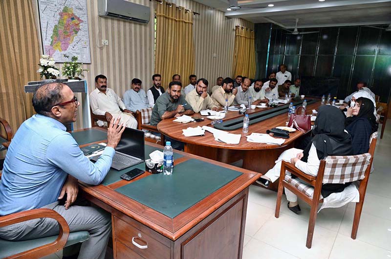 District Public Prosecutor Officer Malik Amir Shahzad addressing WAPDA officials during a meeting regarding legal matters