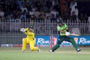 Australian national team players celebrate the wicket of Pakistan’s Sahibzada Farhan during the first One Day International (ODI) between Pakistan national cricket team and Australia national cricket team at the Rawalpindi Cricket Stadium
