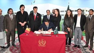 Prince Edourad De Linge-La Termoille Of Belgium recording his comments on visitors book placed at Senate Of Pakistan, Parliament House