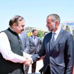Dr. Tariq Fazal Chaudhry, Federal Minister for Parliamentary Affairs, shakes hands with His Highness Prince Rahim Aga Khan before his departure from Islamabad