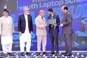 Prime Minister Muhammad Shehbaz Sharif distributes laptops among the beneficiaries from GB under PM's Youth Laptop Scheme.