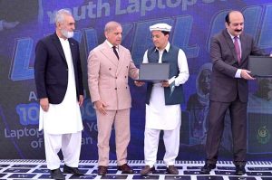 Prime Minister Muhammad Shehbaz Sharif distributes laptops among the beneficiaries from GB under PM's Youth Laptop Scheme.