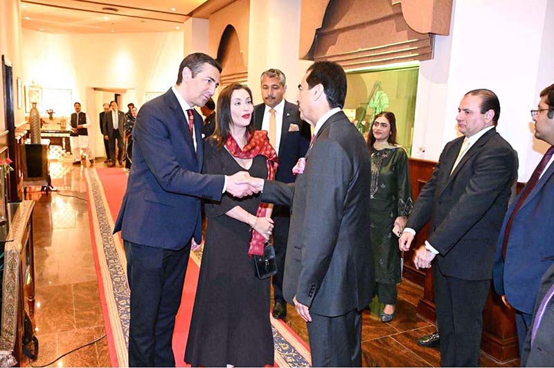 Chairman Senate Syed Yousaf Raza Gilani, welcoming Prince Edouard de Ligne La Tremoille and Princess Isabella Orsini de Ligne La Tremoille of Belgium at a reception hosted in their honour