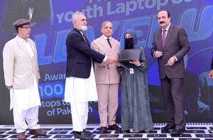 Prime Minister Muhammad Shehbaz Sharif distributes laptops among the beneficiaries from GB under PM's Youth Laptop Scheme.