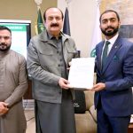 Chairman of the Prime Minister's Youth Programme, Rana Mashhood Ahmad Khan, presenting the notification to Muhammad Rauf Raja as Focal Person Chairman PMYP for Tourism and Hospitality