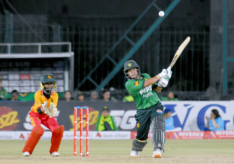Pakistan Women's player Ayesha Zafar plays shot during the 3rd and final day of Women's Cricket W-T20I Series match against Zimbabwe in National Stadium