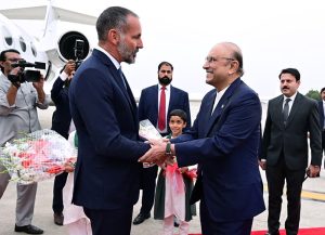 President Asif Ali Zardari and First Lady Bibi Aseefa Bhutto Zardari receiving Prince Shah Rahim Al-Hussaini Aga Khan V, upon his arrival at Noor Khan Airbase.