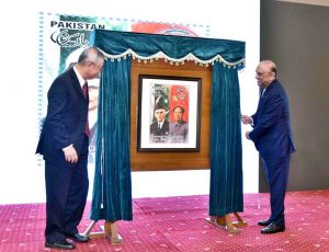 President Asif Ali Zardari and Mr. Cai Dafeng, Vice Chairman of the Standing Committee of the 14th National People’s Congress of China, unveiling a commemorative stamp issued to mark the 75th anniversary of the establishment of diplomatic relations between Pakistan and China.