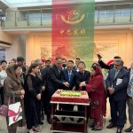 Federal Minister Ahsan Iqbal and Deputy Prime Minister/Foreign Minister Ishaq Dar cutting the anniversary cake during celebrations of 75 years of Pakistan-China diplomatic relations