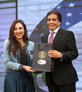 U.S. Chargé d'Affaires, Natalie A. Baker presents souvenir to Federal Minister for Railways, Muhammad Hanif Abbasi, during the FIFA World Cup 2026 TM Launch Event at the Embassy of the United States of America.