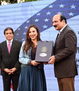 U.S. Chargé d'Affaires, Natalie A. Baker presents souvenir to Federal Minister for Railways, Muhammad Hanif Abbasi, during the FIFA World Cup 2026 TM Launch Event at the Embassy of the United States of America.