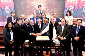 Deputy Prime Minister and Foreign Minister, Ishaq Dar with participants cut the cake on the 75th SAFA anniversary celebration during the SAFA International Future of Finance Summit 2026
