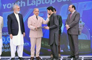 Prime Minister Muhammad Shehbaz Sharif distributes laptops among the beneficiaries from GB under PM's Youth Laptop Scheme.