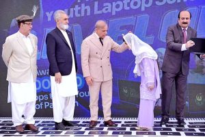 Prime Minister Muhammad Shehbaz Sharif distributes laptops among the beneficiaries from GB under PM's Youth Laptop Scheme.