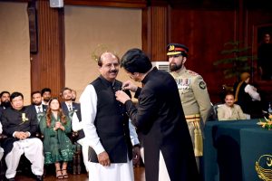 Punjab Governor Sardar Saleem Haider awards the Hilal-e-Imtiaz to Lahore Press Club President Arshad Ansari at Governor House