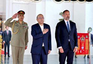 Prince Shah Rahim Al-Hussaini Aga Khan V stands at the dais as a guard of honour is presenting at Aiwan-e-Sadr, along with President Asif Ali Zardari.