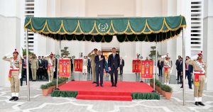 Prince Shah Rahim Al-Hussaini Aga Khan V stands at the dais as a guard of honour is presenting at Aiwan-e-Sadr, along with President Asif Ali Zardari.