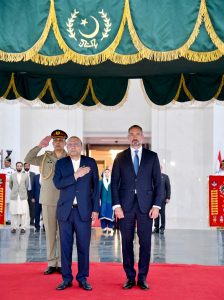 Prince Shah Rahim Al-Hussaini Aga Khan V stands at the dais as a guard of honour is presenting at Aiwan-e-Sadr, along with President Asif Ali Zardari.