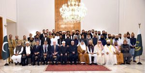 President Asif Ali Zardari in a group photograph with delegates from various countries visiting Pakistan to attend the 6th International Paigham-e-Islam Conference at Aiwan-e-Sadr.