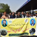 Provincial Minister for Transport and Mass Transit Bilal Akbar Khan leads an awareness walk to sensitize people about the harmful effects of smog