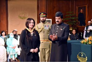 Punjab Governor Sardar Saleem Haider awards the Hilal-e-Imtiaz to Humera Arshad at Governor House