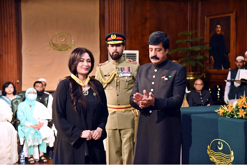 Punjab Governor Sardar Saleem Haider awards the Hilal-e-Imtiaz to Humera Arshad at Governor House