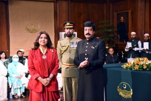Punjab Governor Sardar Saleem Haider awards the Hilal-e-Imtiaz to Hadiqa Kiani at Governor House