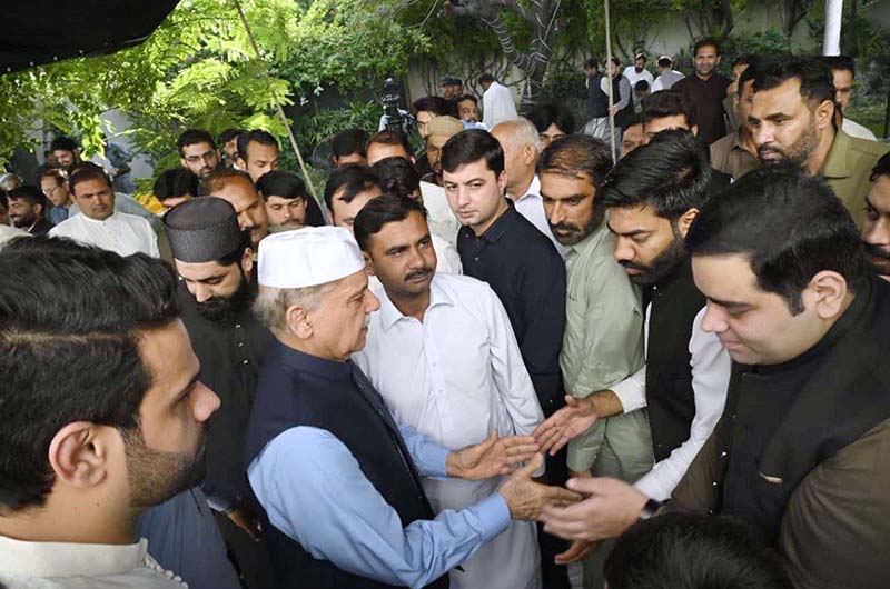 Prime Minister Muhammad Shehbaz Sharif exchanging Eid greetings with people after offers Eidul Azha prayers