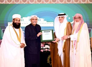 Ambassador of the Kingdom of Saudi Arabia to Pakistan, Nawaf Al-Maliki and Sheikh Talal Al-Aqeel, Advisor to the Minister of Religious Affairs of the Kingdom of Saudi Arabia, presenting a souvenir to President Asif Ali Zardari at Aiwan-e-Sadr.