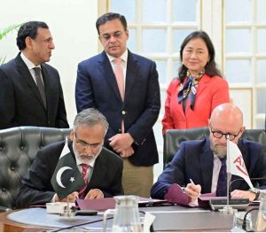 Federal Minister for Economic Affairs Ahad Cheema observing the loan signing ceremony between Pakistan and Asian Infrastructure Investment Bank held in the federal capital.