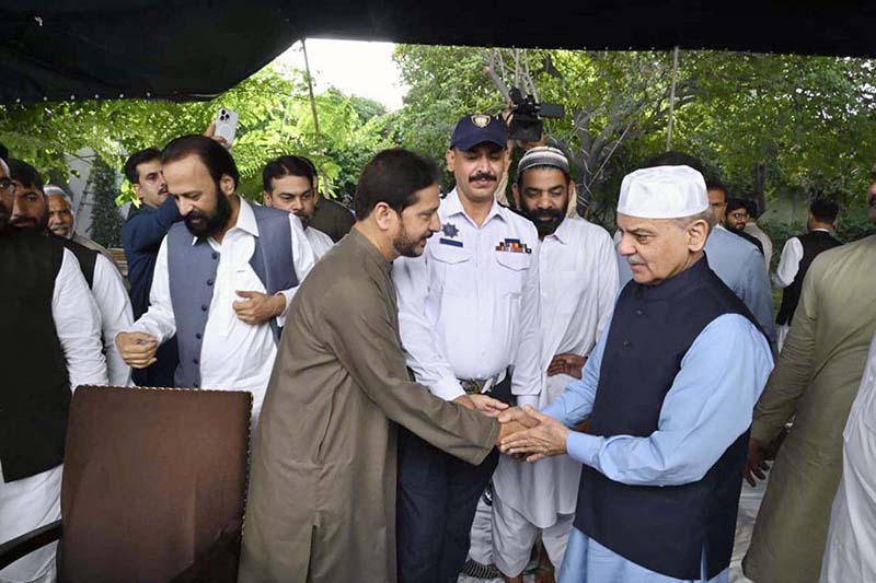 Prime Minister Muhammad Shehbaz Sharif exchanging Eid greetings with people after offers Eidul Azha prayers