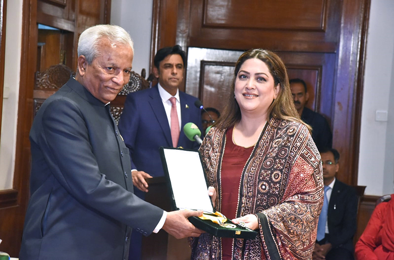 Sindh Governor, Syed Muhammad Nehal Hashmi awards the Hilal-e-Imtiaz to Fazila Qazi at Governor House