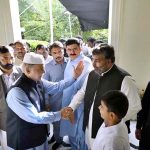 Prime Minister Muhammad Shehbaz Sharif exchanging Eid greetings with people after offers Eidul Azha prayers