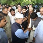 Prime Minister Muhammad Shehbaz Sharif exchanging Eid greetings with people after offers Eidul Azha prayers