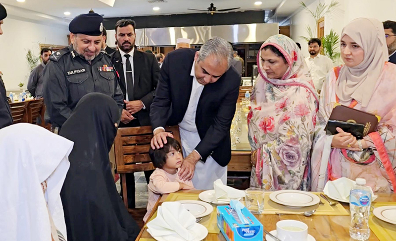 Federal Minister for Interior Mohsin Naqvi meets the families of police personnel martyred in Bannu during his visit to the Police Headquarters