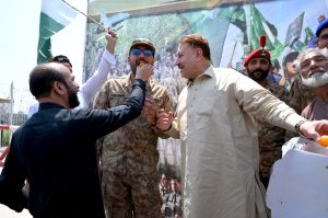 People show solidarity with Pakistani armed forces in front of the paramilitary FC headquarters, during the marking of the first commemoration of Marka-e-Haq.