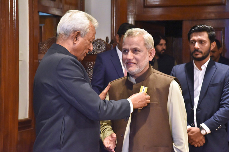 Sindh Governor, Syed Muhammad Nehal Hashmi confers civil award the Hilal-e-Imtiaz to Dr. Mumtaz Umar at Governor House