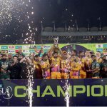 Peshawar Zalmi captain Babar Azam, along with teammates, celebrates with the trophy after winning the Pakistan Super League (PSL 11) final match against Hyderabad Kingsmen at Gaddafi Stadium