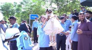 IG Islamabad celebrates Eid with families of police martyrs