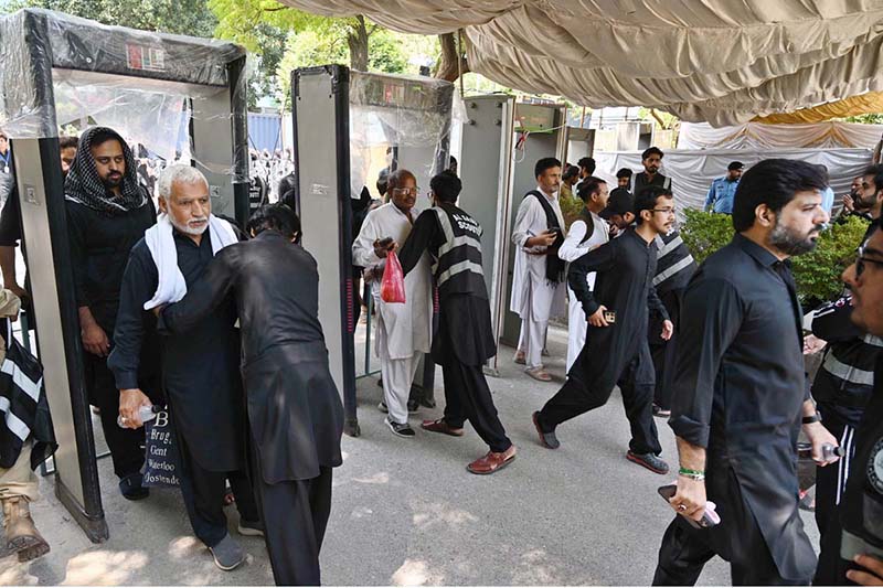 Security personnel checks people at the entrance point that arrives to attend the main procession on 9th of Muharram-ul-Haram at G-6. Muharramul Harram known as the first month of the Islamic calendar and the mourning month in remembrance of the martyrdom (Shahadat) of Hazrat Imam Hussain (RA), the grandson of the Holy Prophet Mohammad (PBUH)