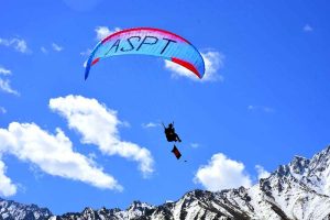 A view of paratrooper demonstrating his skills during the opening ceremony of the Shandur Polo Festival 2026 at the world’s highest polo ground