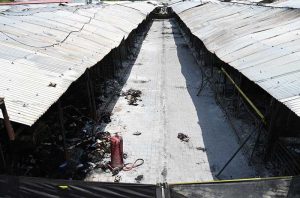 A devastating view of burnt and charred shops at H-9 Bazaar following a major fire incident that gutted scores of commercial stalls in the market a few days ago