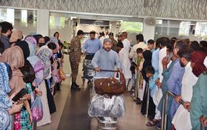 MNA, Bilal Badar Chaudhary receiving pilgrims of first Hajj flight at Faisalabad International Airport returning from Saudi Arabia