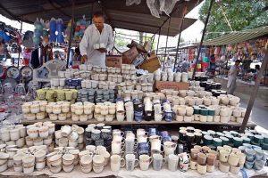 A vendor displays mosquito nets to be used to protect babies from mosquito bites at the I/9-4 weekly bazaar in the Federal Capital