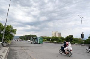 A view of vehicles on the way at Islamabad Highway during rain that experienced the in Federal Capital.