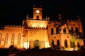 A beautiful night view of old campus building decorated with colorful lights at Court road.