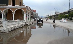 A view of rain water accumulated on Murree Road after rain that experienced the Twin Cities.