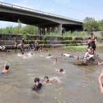 A large number of youngsters swim and splash in the Rawal Lake spillway waters to seek relief from the intense summer heat in the federal capital. The spillway has become a popular spot for young citizens looking to cool off as temperatures soar across Islamabad during the ongoing heat wave season