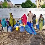 A large number of women filling their pots with water from water tap at Husenabd area